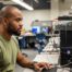 veteran working in network engineer lab at school campus