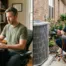 split screen of veteran looking at laptop on one side and the other side working in HVAC
